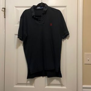 Men’s black polo. Size M.